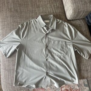 Bundle of men's short sleeve collared shirts.